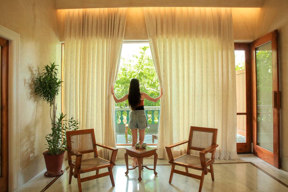 Opening curtains to the garden